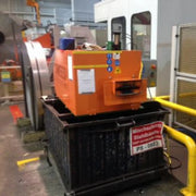 image of a Sweed CE517XHD strapping chopper in a warehouse setting