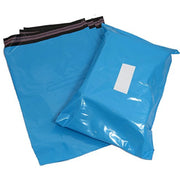 blue poly mailing bags with one mailing bag filled and sealed on a white background