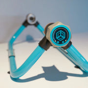 Closeup detail of the tensioning knob of a Grip Paperflex desktop dispenser that is used with Grip Paperflex honeycomb paper