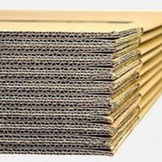 closeup of the double wall construction of large cardboard boxes on a white background