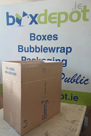 medium single wall cardboard box in front of Box Depot advertising