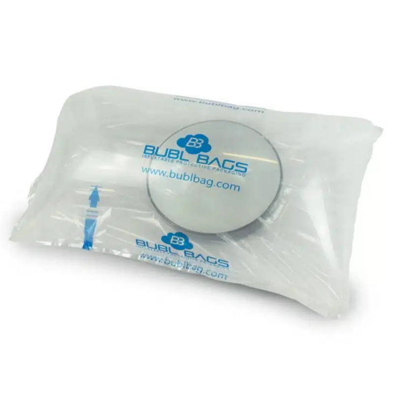 a china plate inside an inflated protective bubl air cushioning bag on a white background