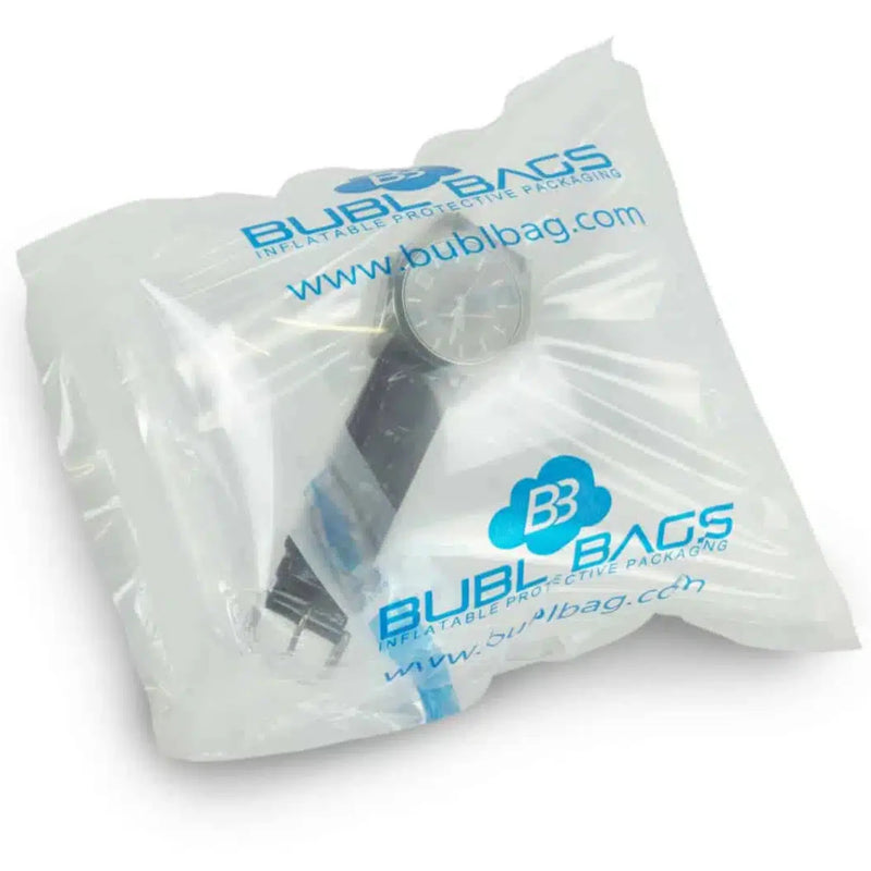 a wristwatch inside an inflated protective bubl air cushioning bag on a white background