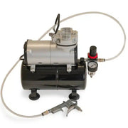 Air compressor with hose and spray gun on a white background for use with Bubl air cushioning packaging from Box Depot