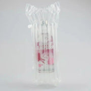 a bottle of vodka in an inflated Bubl Single air cushioning pod on a plain background