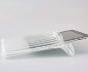 a computer tablet inside an inflated protective bubl air cushioning pod on a plain background