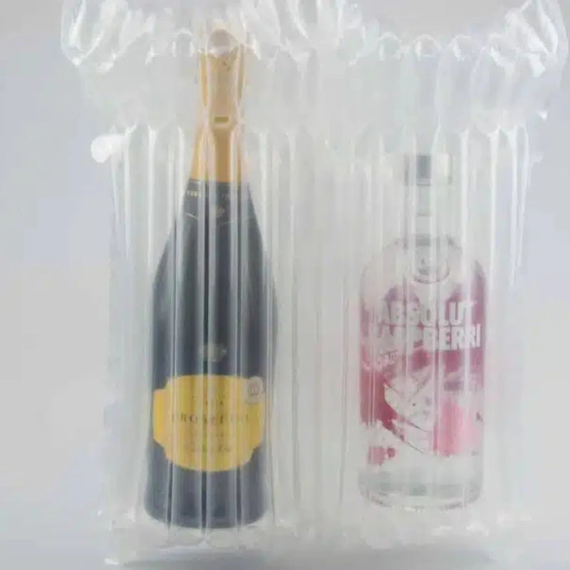 two bottles of Prosecco and Vodka protected in an inflated Bubl Twin air cushioning pod on a plain background