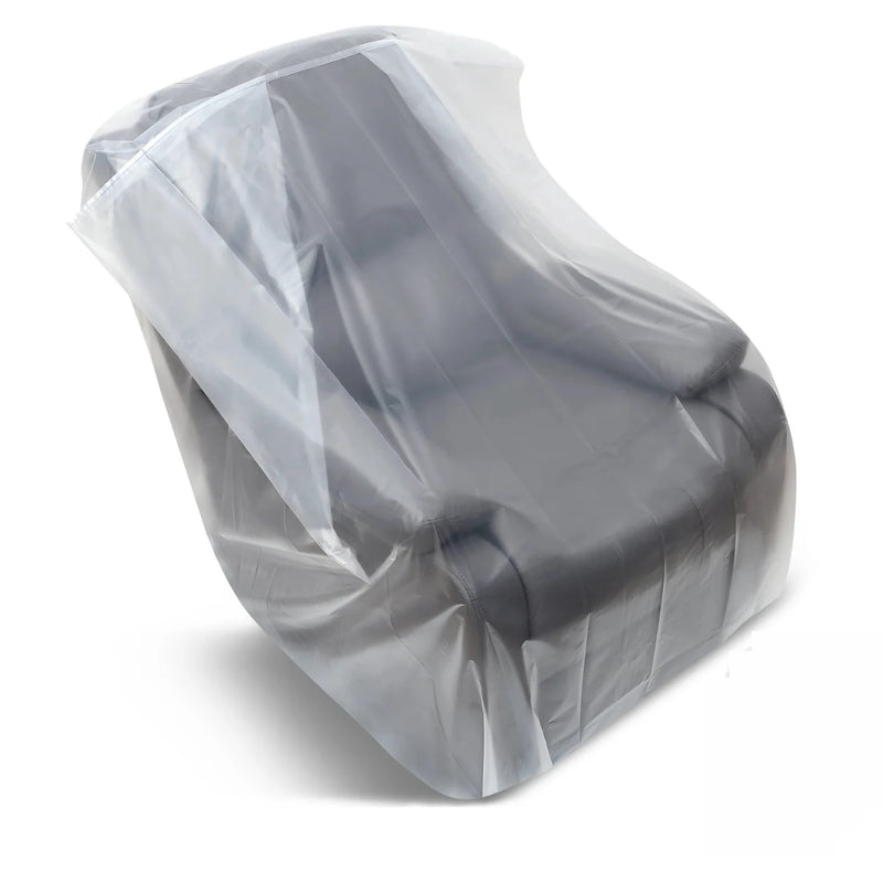 a reclining armchair covered by a clear chair bag on a white background