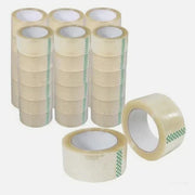 36 rolls of clear sealing tape from a carton and 2 additional rolls of clear sealing tape on a white background