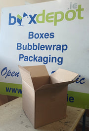 small single wall cardboard in front of Box Depot advertising