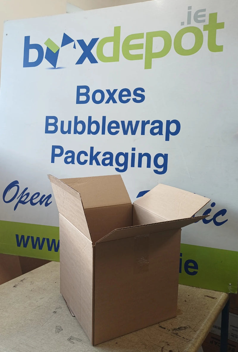 small single wall cardboard in front of Box Depot advertising