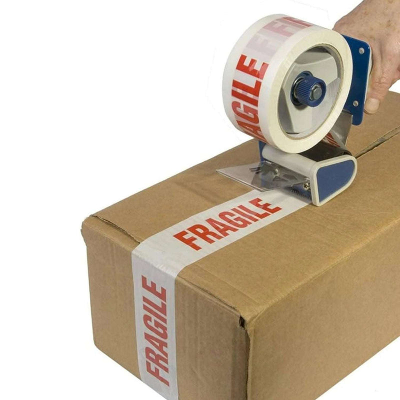 a cardboard box being sealed with a tape gun and fragile tape on a white background