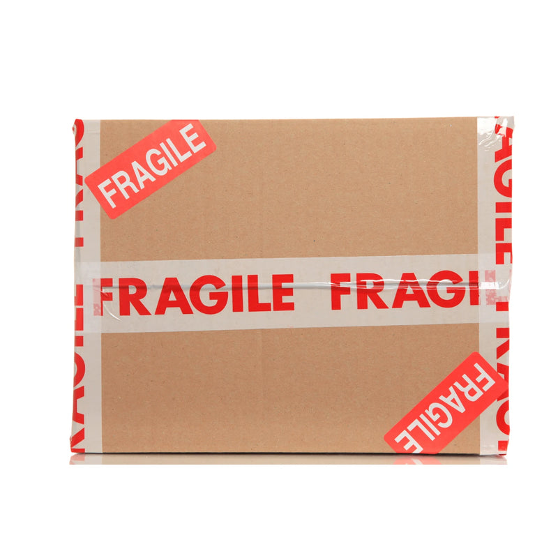 Cardboard box with fragile tape and stickers on a white background