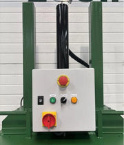 closeup of GE100 cardboard baler control panel in warehouse surroundings