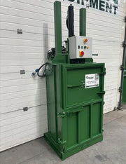 front view of a GE100 cardboard baler in a warehouse environment