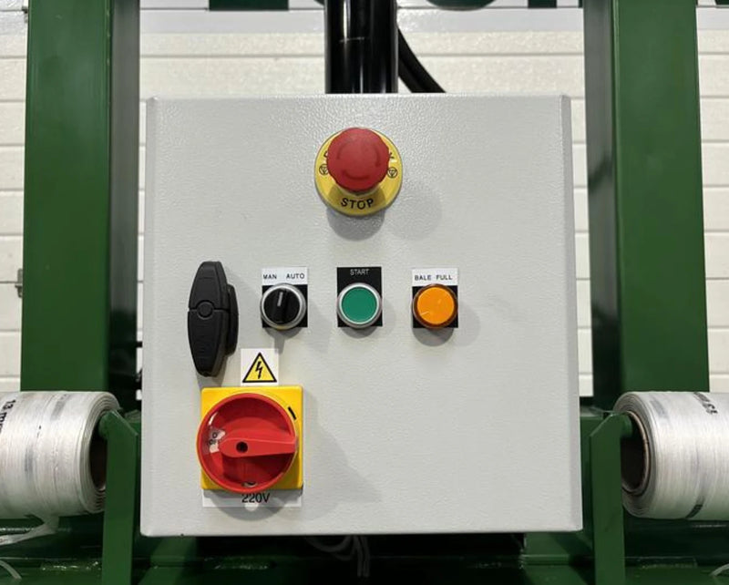 closeup of the control panel of a GE200 cardboard baler