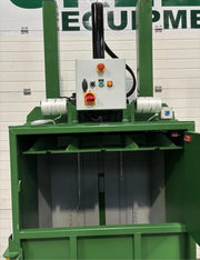 closeup of the front opening of a GE200 cardboard baler in warehouse environment
