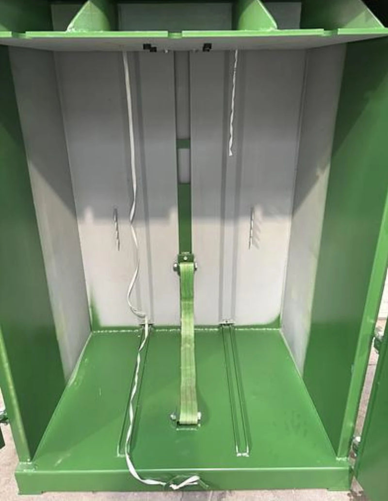 closeup of the GE200 cardboard baler area where flattened cardboard is baled