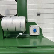 closeup of a power switch and baling twine reel on a GE200 cardboard baler