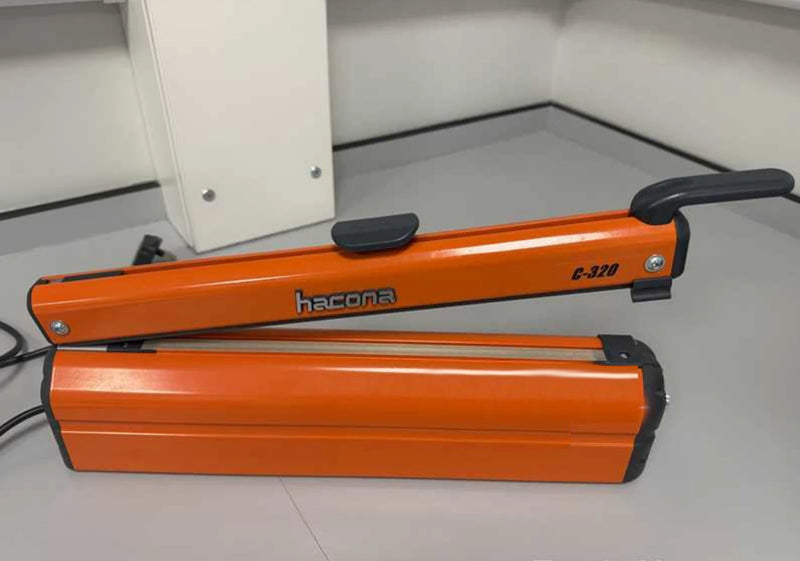 Hacona C320 Heat Sealer on a neutral warehouse floor