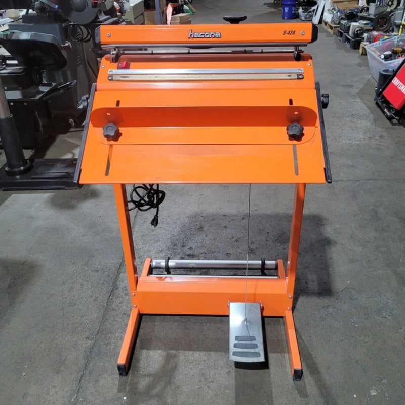 Hacona S Type Heat Sealer with foot pedal in a warehouse environment