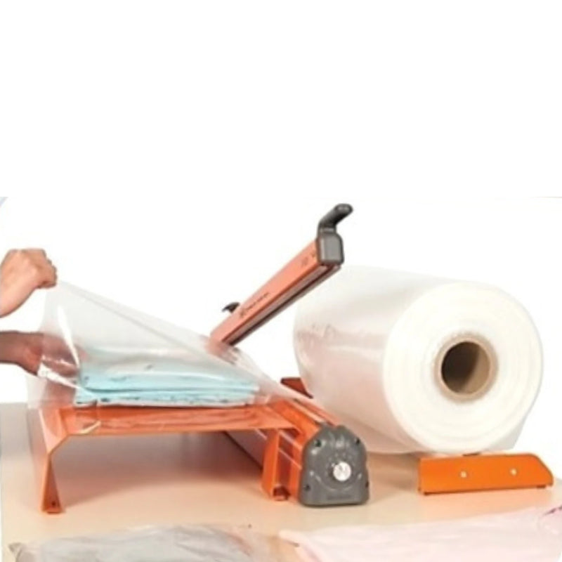 Person sealing clothing in layflat tubing bags using a Hacona Heat Sealer