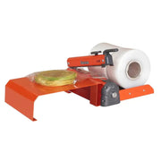 Hacona Heat Sealer with a sealed bag of wiring and modular bag roll holder and table on a white background