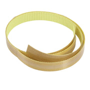 A short loose length of teflon tape used with a Hacona Heat Sealer on a white background