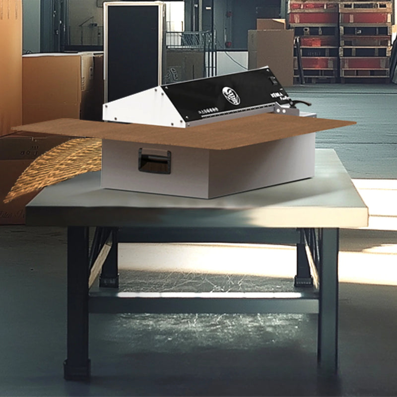 Kobra FlexPack Tabletop Cardboard Shredder n a warehouse setting
