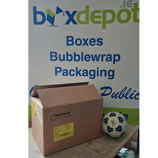 image of medium single walled pre-loved cardboard box beside a football in front of Box Depot sign