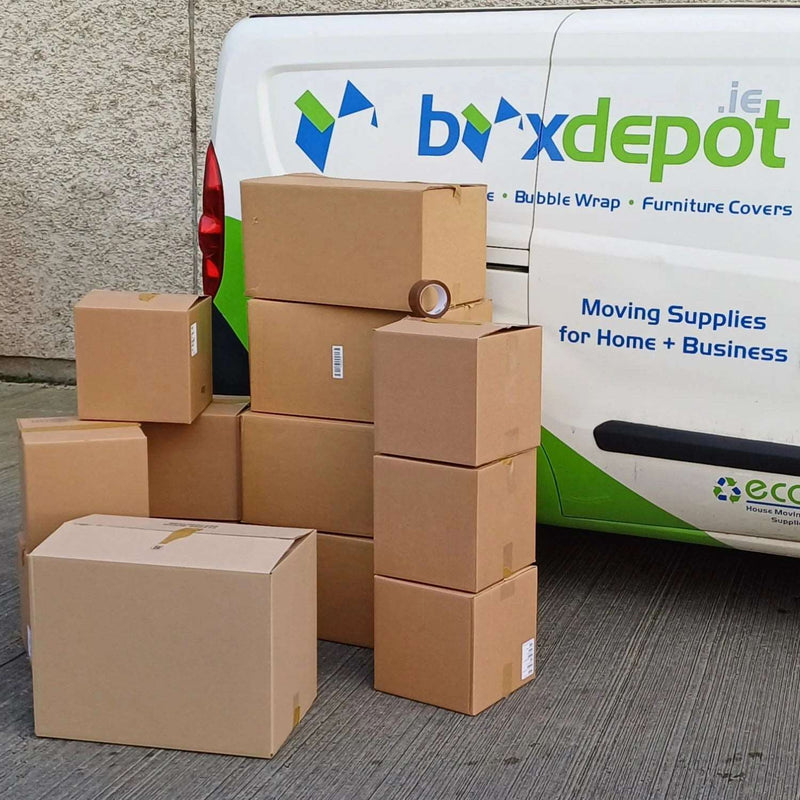 closeup of the Mini moving kit in front of the Box Depot van