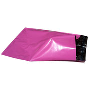 one empty pink mailing bag on a white background
