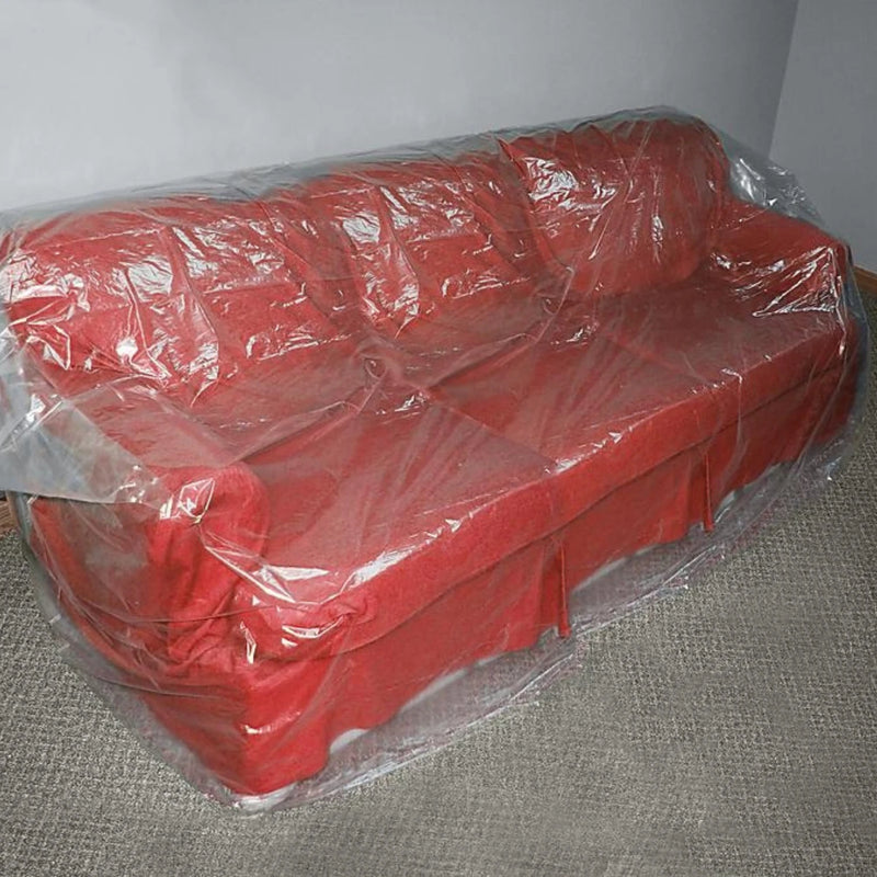 three seat sofa in a neutral living room covered with a three-seat sofa bag