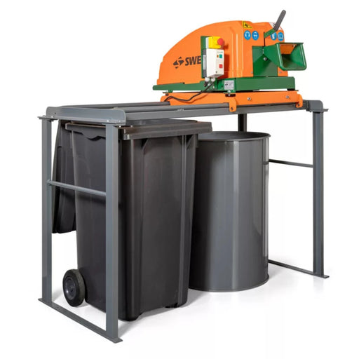 image of a Sweed CE450DDX strapping chopper machine on a grey metal frame with wheelie bins underneath to catch the strapping pieces