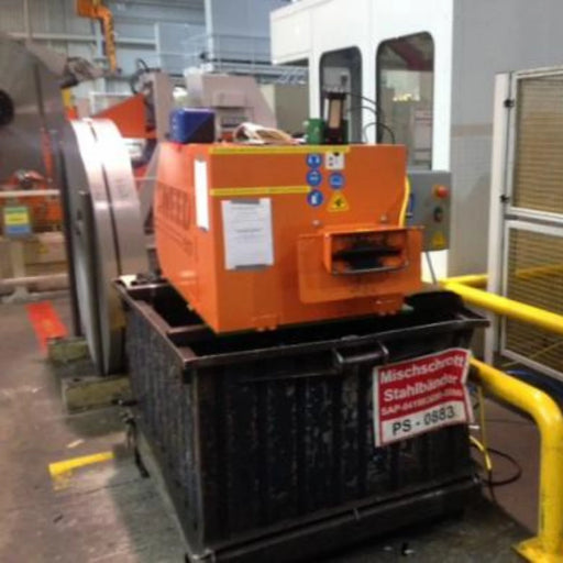 image of a Sweed CE517XHD strapping chopper in a warehouse setting