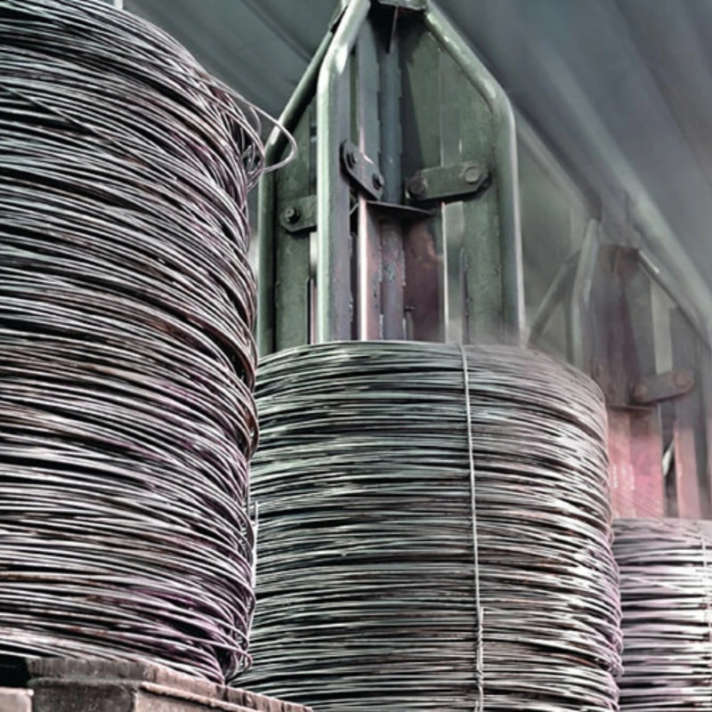 Coils of wire in an industrial warehouse setting
