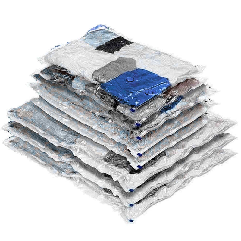 Various sizes of vacuum storage bags filled with clothes on a white background