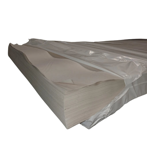closeup of an opened ream of white packaging paper on a white background