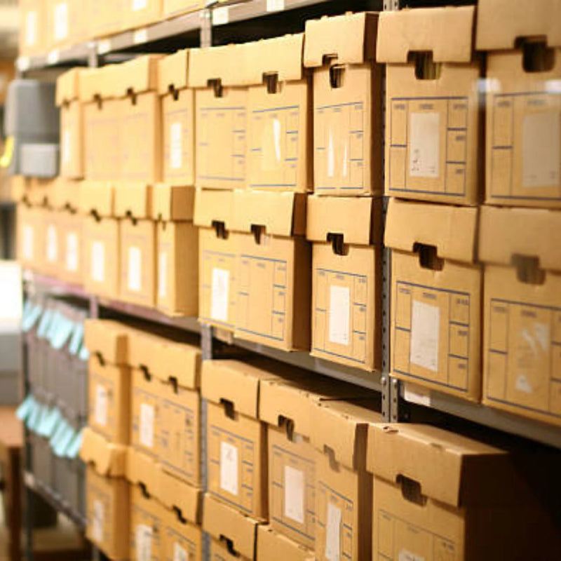 Rows of archive boxes stacked on shelving