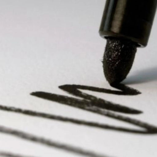 ink strokes and squiggles showing how thick a black permanent marker writes