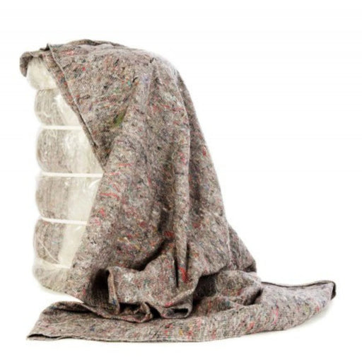 a full bale of 25 furniture transit blankets with one blanket draped over the bale on a white background