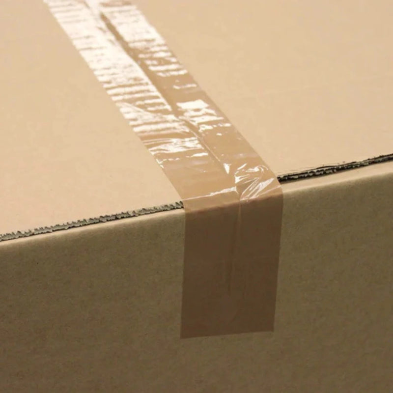 close up image of a cardboard box sealed with brown sealing tape