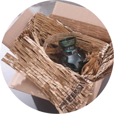 closeup of shredded cardboard matting made using a CushionPack Cardboard Shredder