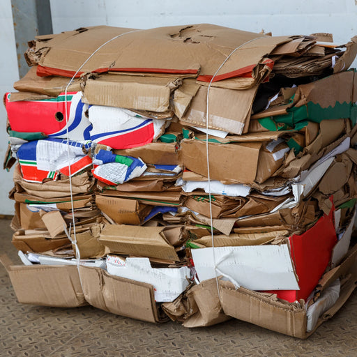 a bale of flat cardboard baled with the use of a Cardboard Baler from Box Depot