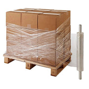 pallet of cardboard boxes being wrapped in clear pallet wrap on a white background