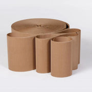 a roll of partly unrolled corrugated cardboard showing the ridges of the corrugated cardboard on a white background