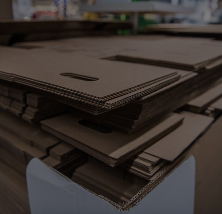 flat unassembled pile of single wall cardboard boxes