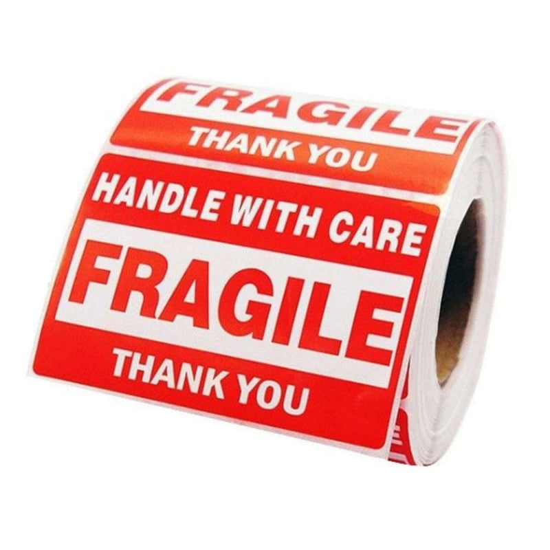a roll of fragile labels on a white background