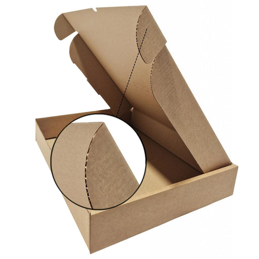 details of a brown diecut cardboard postal box with a flap open, showing the interior. The box is flat-packed that is made from recycled cardboard on a white background. The detail shows that the box is single walled.