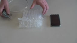 a video detailing how to use Bubl air cushioning pods to safely pack a mobile phone for shipping